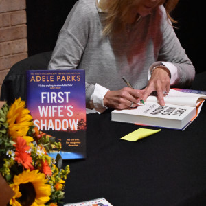 Adele Parks signs books