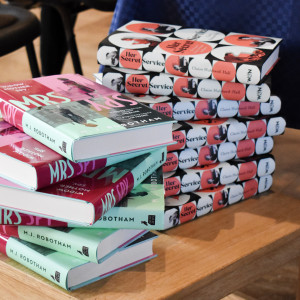 Copies of Mrs Spy and Her Secret Service stacked on a table